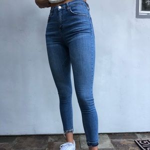 Top Shop Light wash skinny jeans with tapered ends